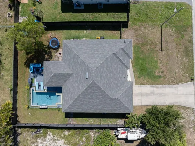 View from above of property featuring a pool