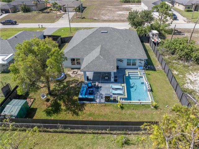 Aerial view of residential area with a pool