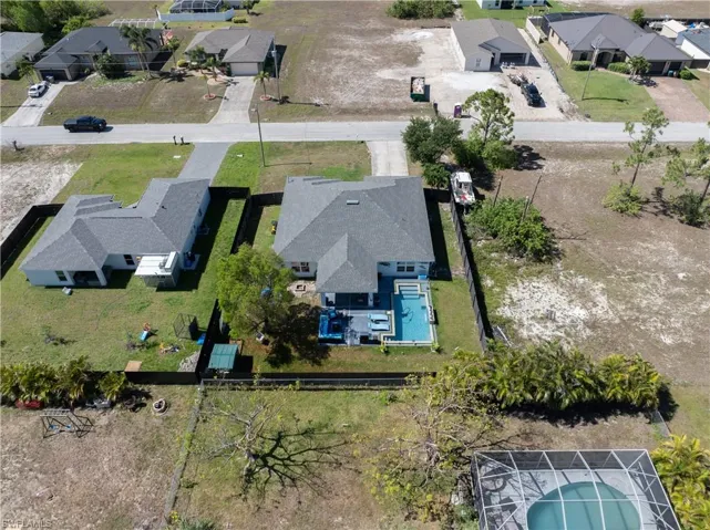 Aerial view of residential area with a pool area