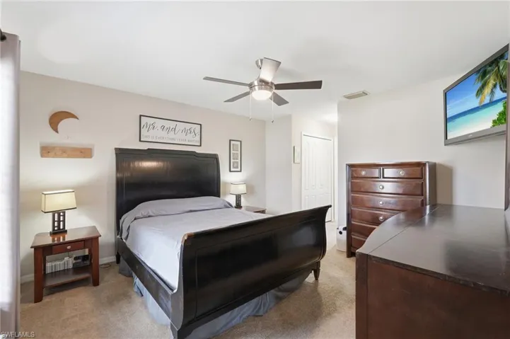 Neutral tone wall paint with a ceiling fan light fixture