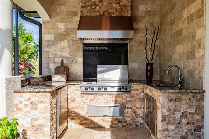 Kitchen featuring sink and tile flooring