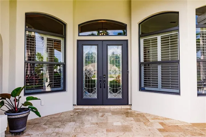 Entrance to property with french doors