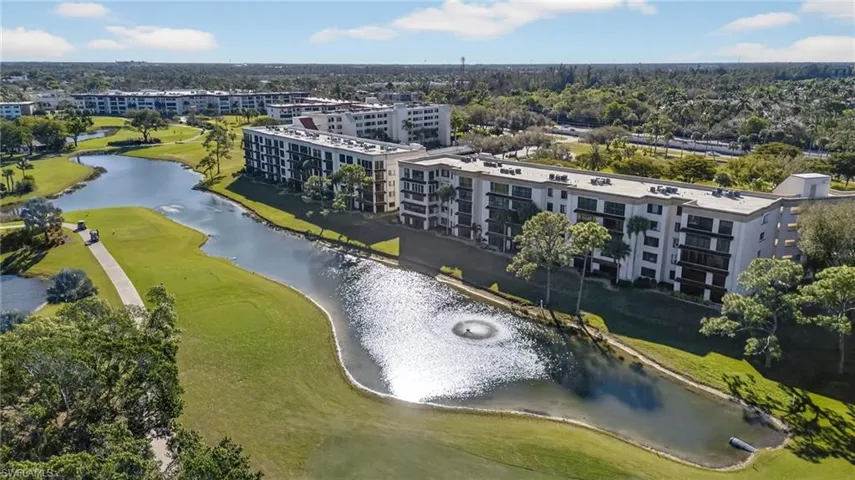 Aerial view of a large body of water and a local golf course