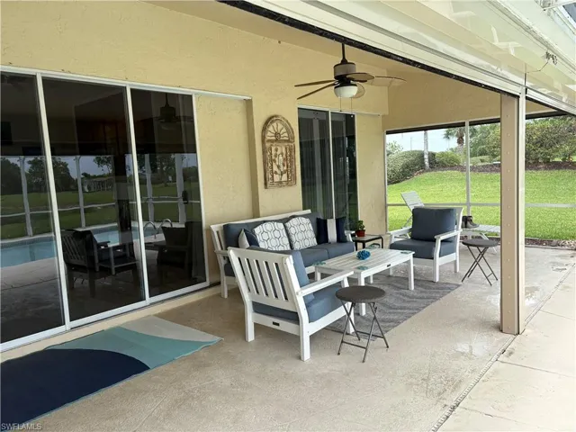 View of patio / terrace featuring an outdoor living space and a ceiling fan