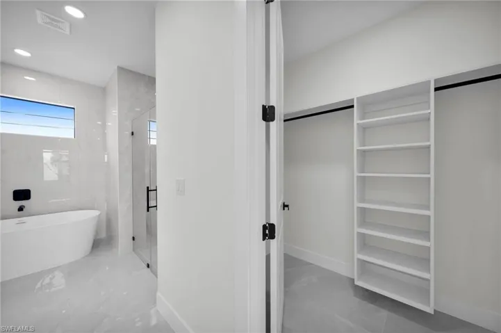 Bathroom with plus walk in shower