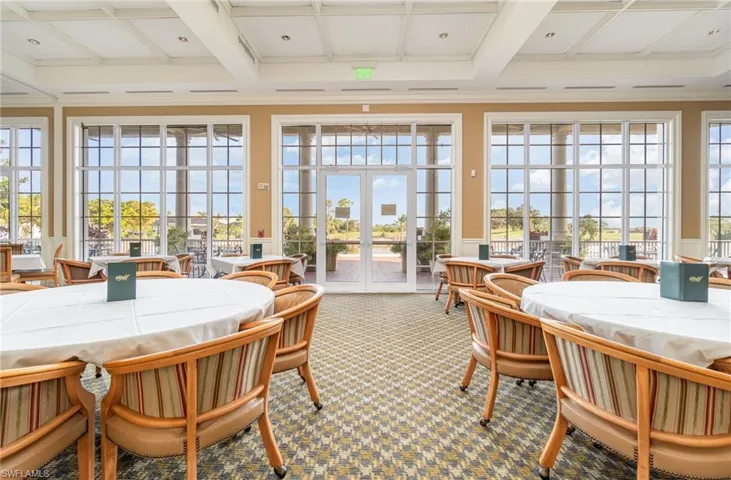 Clubhouse Sunroom / solarium with plenty of natural light, french doors, and coffered ceiling