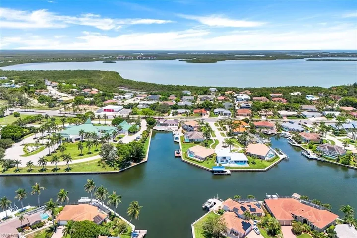 Aerial view of residential area with a large body of water