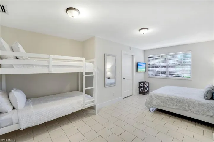 Bedroom featuring baseboards
