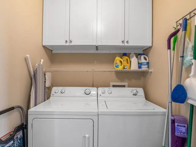 Laundry (full size) closet w/built-in storage Cabinets