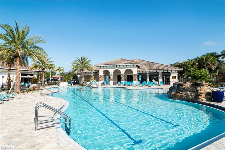 Community: main pool, with zero entry, jacuzzi, lap lanes, fountain, and pool dining service (1 of 6 pools in the Community)