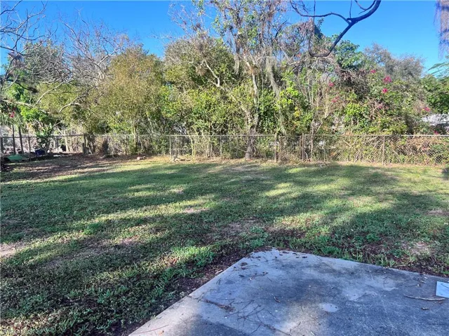 View of yard featuring a patio area and fence