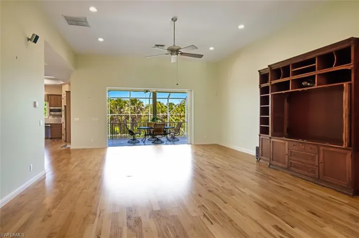 Unfurnished living room featuring recessed lighting, light wood finished floors, and a ceiling fan