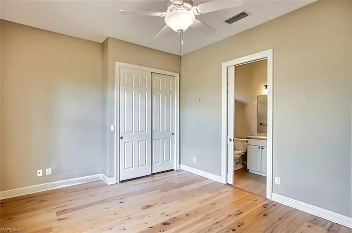 Full bath featuring vanity, shower / bath combination with curtain, and tile patterned flooring