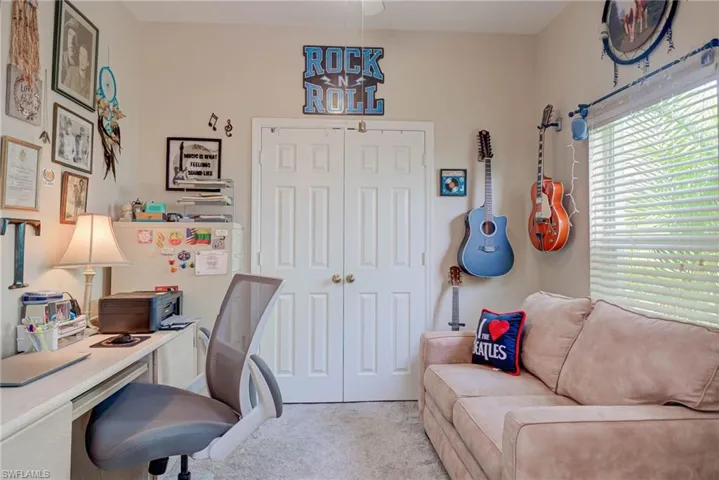 Sitting area in primary bedroom is perfect for office, nursery or exercise room!