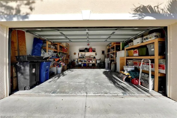 Nice built in shelving in garage.