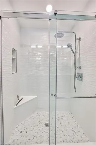Full bathroom with a stall shower