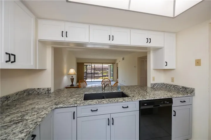 Granite countertops and soft shut cabinets