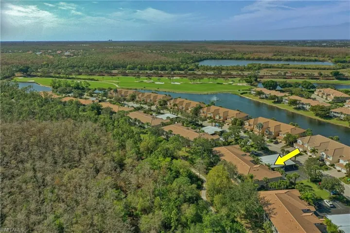 Aerial overview of property's location featuring a large body of water