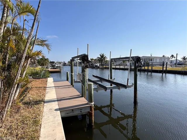 Composite Dock and Lift, and newer seawall.