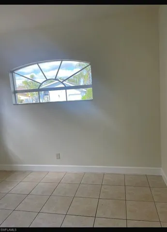 View of tiled spare room