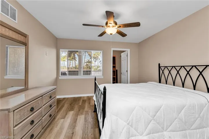 Bedroom featuring light wood-style floors and a ceiling fan