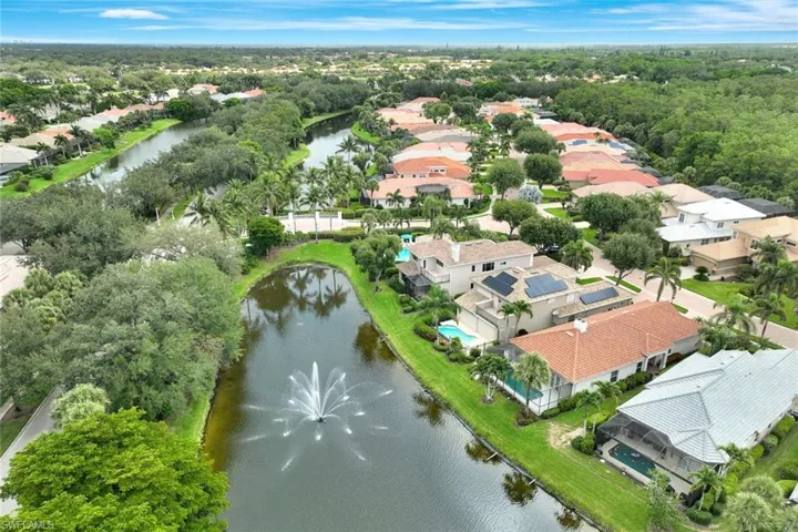 Aerial view of residential area with a large body of water