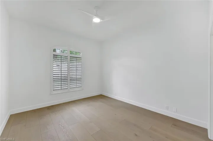 Front room with a ceiling fan and wood finished floors