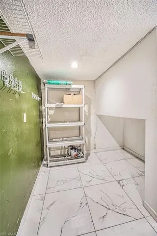 LAUNDRY ROOM with AMPLE STORAGE