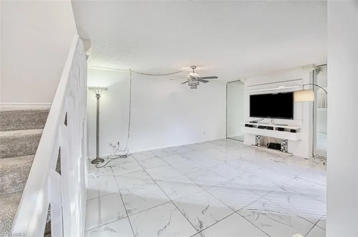 LIVING / FAMILY ROOM OVERLOOKING COURTYARD