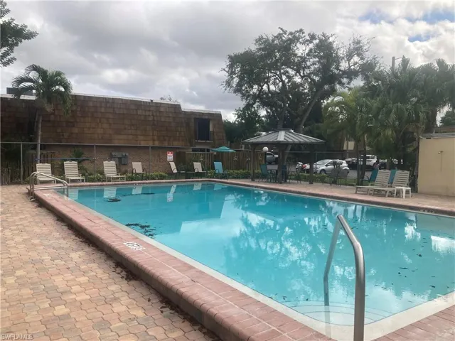Large Rectangular Pool with covered areas for sitting and relaxing