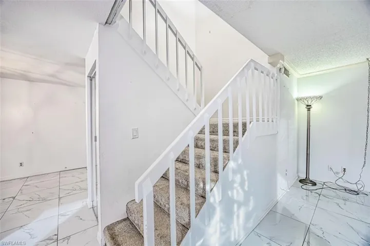 ENTRANCE to MAIN ROOMS and STAIRS to BEDROOMS