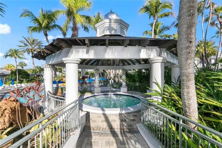 Lovely hot tub among the pools