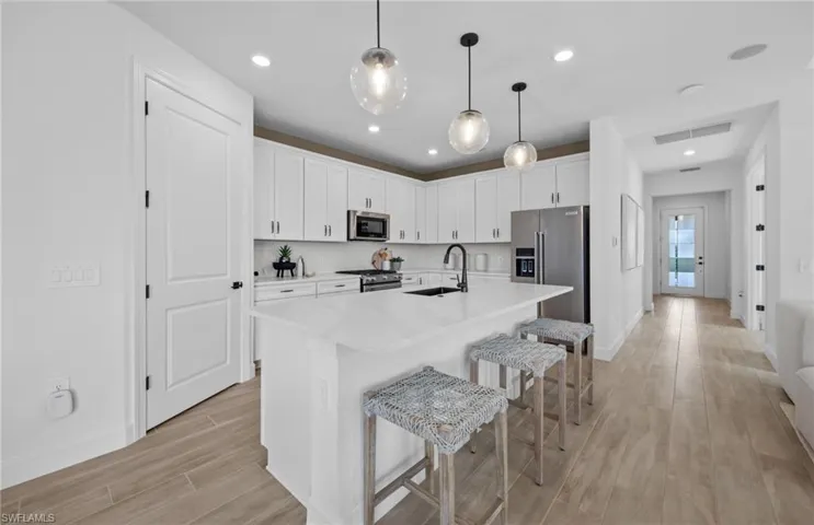 Photos are from a furnished model. Options for this home may vary.