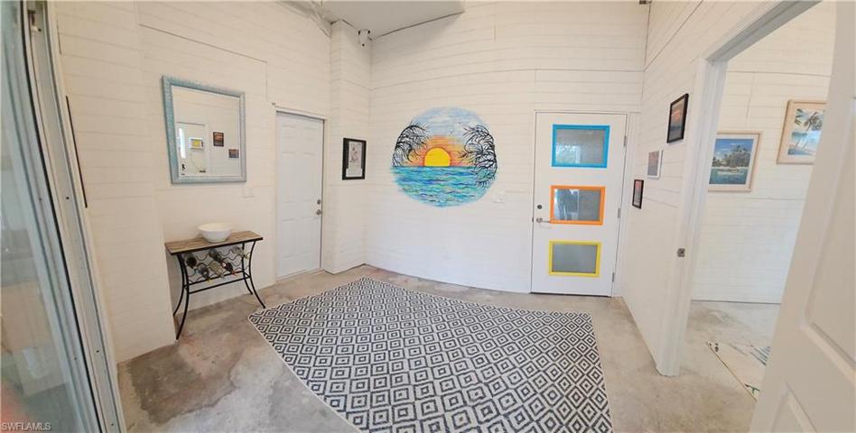 Ground level side and garage entry vestibule