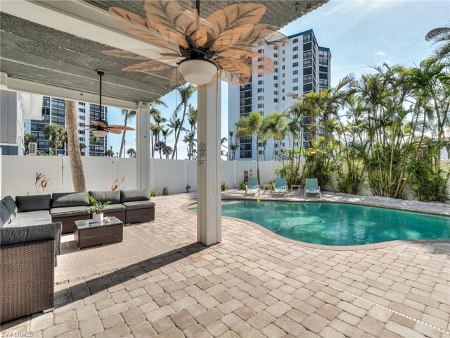 Entertain poolside with covered seating area, tiki wet bar with granite counters and stainless steel sink.