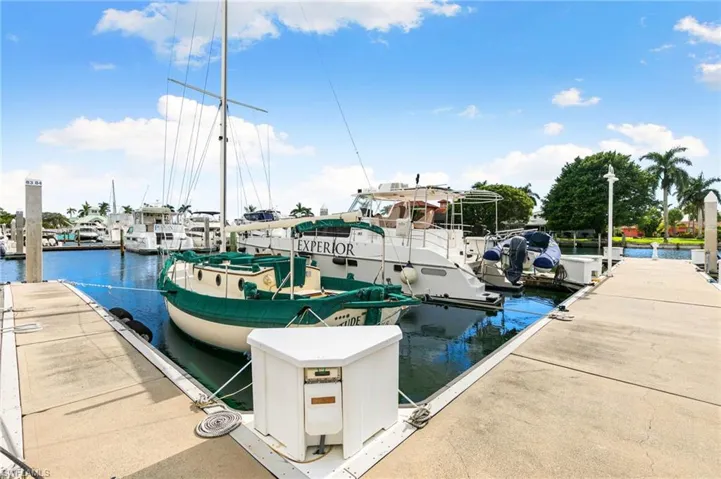 Dock featuring a water view
