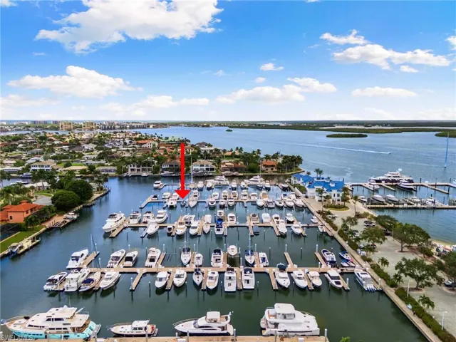 Bird's eye view of a marina and a nearby body of water