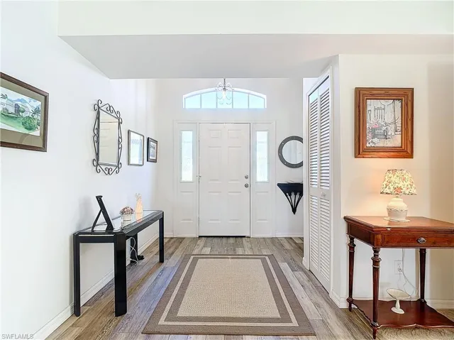 Bright Entrance foyer featuring luxury vinyl flooring