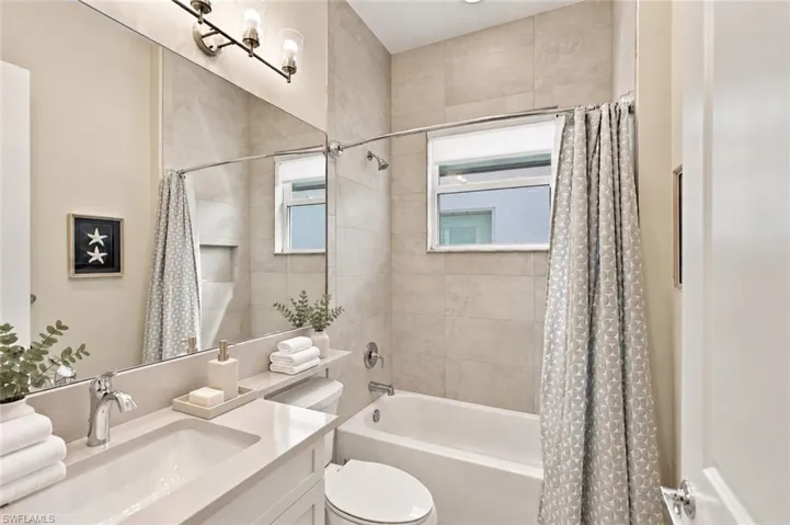 guest bathroom with tub
