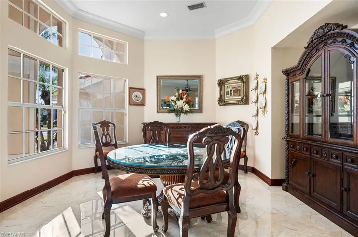 Dining room featuring ornamental molding