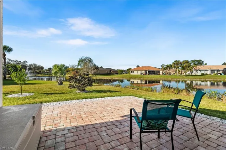 View of patio / terrace with a water view