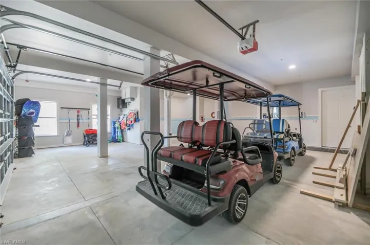 Garage featuring a garage door opener