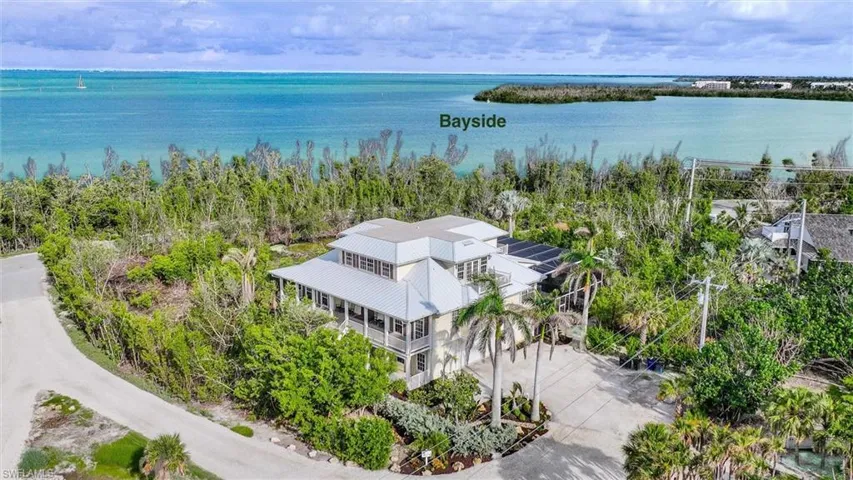 View from above of property with a large body of water