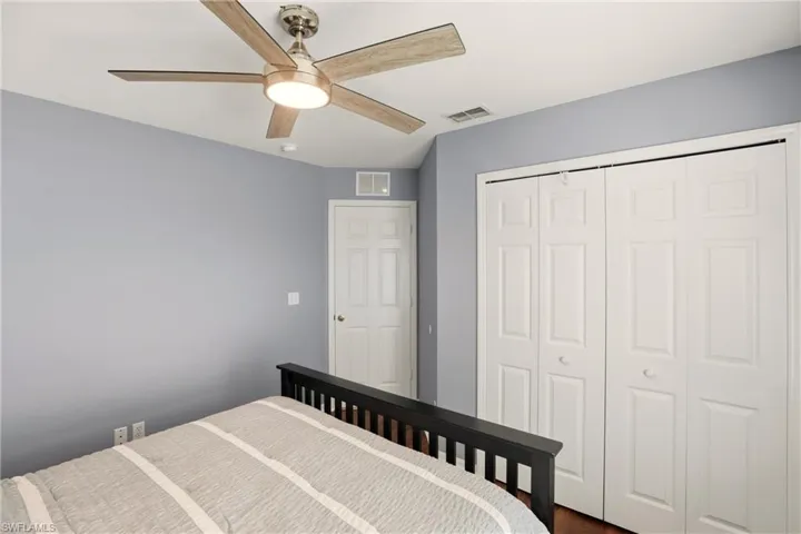 Bedroom featuring a closet and ceiling fan