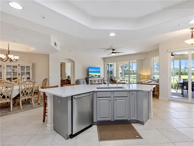Kitchen with a raised ceiling ,open floor plan