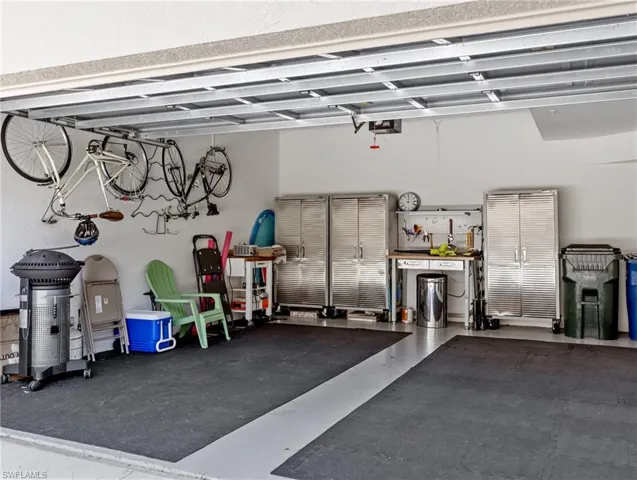 Garage featuring high ceilings