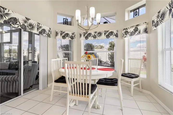 Sunroom with a chandelier