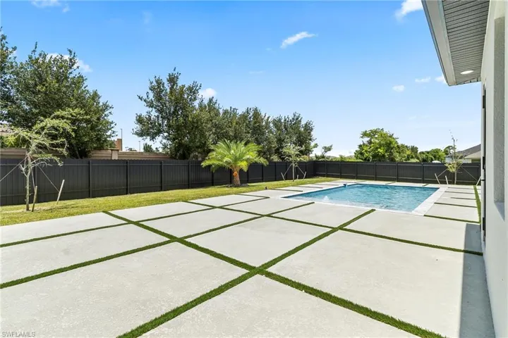 View of pool with a patio area