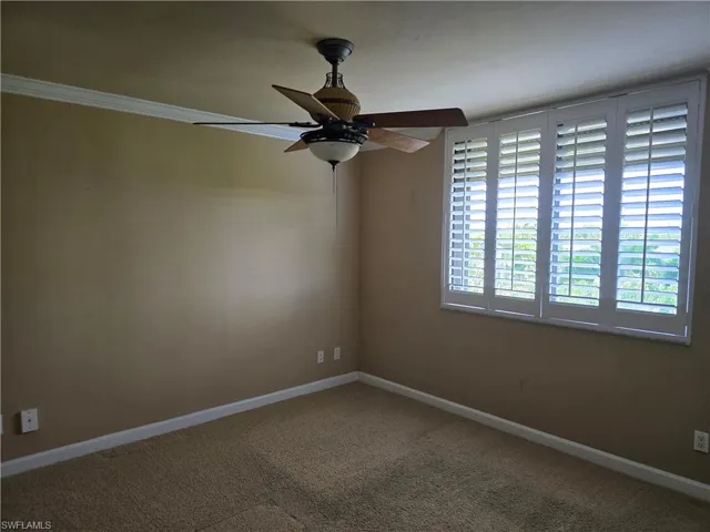 2nd Bedroom has Crown Molding and Plantation Blinds