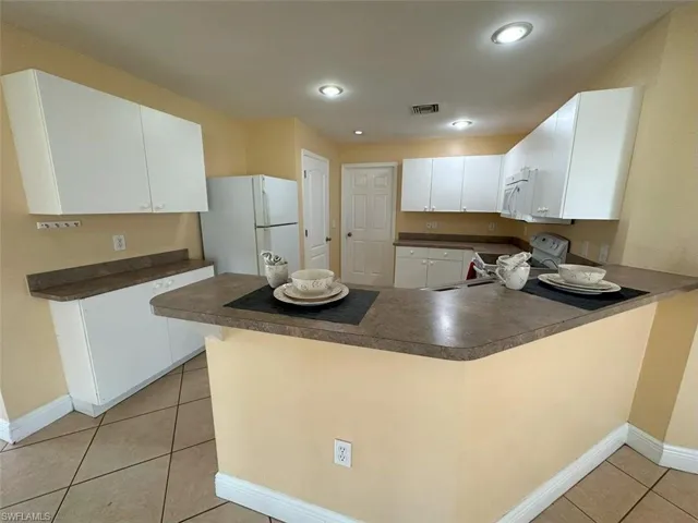 1209 NW 18th  TER, Cape Coral, FL 33993